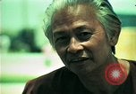 Standbild Vietnamesischer Flüchtling Mann interviewt werden United States USA, 1975, aus Sekunde 58 historischem Filmmaterial Videoclip 65675050944