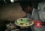 Standbild Vietnamesische Flüchtlinge in Eglin Air Force Base Speisesaal United States USA, 1975, aus Sekunde 22 historischem Filmmaterial Videoclip 65675050948