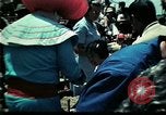 Standbild Clown unterhält vietnamesischer Flüchtlingskinder Florida United States USA, 1975, aus Sekunde 18 historischem Filmmaterial Videoclip 65675050952