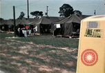 Standbild Kaplan spricht für vietnamesische Flüchtlinge United States USA, 1975, aus Sekunde 56 historischem Filmmaterial Videoclip 65675050954