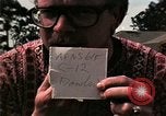 Standbild Vietnamesische Flüchtlinge Kinder essen Süßigkeiten Florida United States USA, 1975, aus Sekunde 7 historischem Filmmaterial Videoclip 65675050958