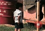 Standbild Vietnamesische Flüchtlinge Kinder essen Süßigkeiten Florida United States USA, 1975, aus Sekunde 44 historischem Filmmaterial Videoclip 65675050958