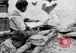Immagine di Seminole nativi indiani americani cucinare il cibo Florida United States USA, 1919, secondo 9 filmato di repertorio 65675050982