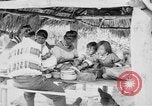 Immagine di Seminole nativi indiani americani cucinare il cibo Florida United States USA, 1919, secondo 23 filmato di repertorio 65675050982
