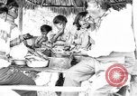 Immagine di Seminole nativi indiani americani cucinare il cibo Florida United States USA, 1919, secondo 27 filmato di repertorio 65675050982