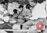 Immagine di Seminole nativi indiani americani cucinare il cibo Florida United States USA, 1919, secondo 29 filmato di repertorio 65675050982