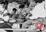 Immagine di Seminole nativi indiani americani cucinare il cibo Florida United States USA, 1919, secondo 30 filmato di repertorio 65675050982