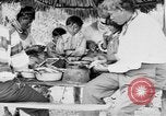 Immagine di Seminole nativi indiani americani cucinare il cibo Florida United States USA, 1919, secondo 31 filmato di repertorio 65675050982