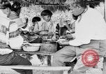 Immagine di Seminole nativi indiani americani cucinare il cibo Florida United States USA, 1919, secondo 44 filmato di repertorio 65675050982
