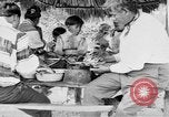 Immagine di Seminole nativi indiani americani cucinare il cibo Florida United States USA, 1919, secondo 45 filmato di repertorio 65675050982
