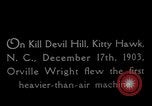 Image of Wright Brothers first flight at Kitty Hawk France, 1908, second 3 stock footage video 65675051058