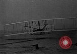 Image of Wright Brothers first flight at Kitty Hawk France, 1908, second 15 stock footage video 65675051058