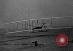 Image of Wright Brothers first flight at Kitty Hawk France, 1908, second 18 stock footage video 65675051058