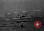 Image of Wright Brothers first flight at Kitty Hawk France, 1908, second 21 stock footage video 65675051058