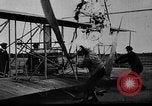 Image of Wright Brothers first flight at Kitty Hawk France, 1908, second 40 stock footage video 65675051058
