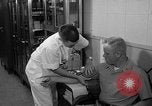 Standbild Preflight physischen Checkup United States USA, 1962, aus Sekunde 42 historischem Filmmaterial Videoclip 65675051196