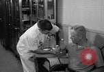 Standbild Preflight physischen Checkup United States USA, 1962, aus Sekunde 43 historischem Filmmaterial Videoclip 65675051196