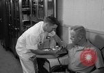 Standbild Preflight physischen Checkup United States USA, 1962, aus Sekunde 45 historischem Filmmaterial Videoclip 65675051196