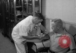 Standbild Preflight physischen Checkup United States USA, 1962, aus Sekunde 46 historischem Filmmaterial Videoclip 65675051196