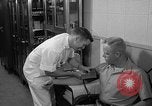 Standbild Preflight physischen Checkup United States USA, 1962, aus Sekunde 48 historischem Filmmaterial Videoclip 65675051196