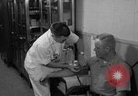 Standbild Preflight physischen Checkup United States USA, 1962, aus Sekunde 58 historischem Filmmaterial Videoclip 65675051196