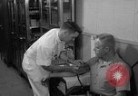 Standbild Preflight physischen Checkup United States USA, 1962, aus Sekunde 62 historischem Filmmaterial Videoclip 65675051196