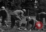 Standbild United States 87th Chemical Mortar Bataillon Carentan Frankreich, 1944, aus Sekunde 55 historischem Filmmaterial Videoclip 65675051322