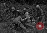 Standbild United States 87th Chemical Mortar Bataillon Carentan Frankreich, 1944, aus Sekunde 62 historischem Filmmaterial Videoclip 65675051322