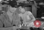 Standbild United States Navy Segler geniessen Eis Pazifik, 1954, aus Sekunde 25 historischem Filmmaterial Videoclip 65675051350