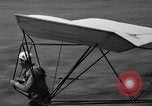 Image of early hang glider flight attempt Palos Verdes California USA, 1936, second 40 stock footage video 65675051384
