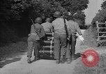 Immagine di Soldati americani Cherbourg Normandia Francia, 1944, secondo 21 filmato di repertorio 65675051432