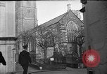 Image of United States Coast Guard personnel march in formation to Sunday service at a church England United Kingdom, 1944, second 13 stock footage video 65675051454