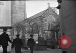 Image of United States Coast Guard personnel march in formation to Sunday service at a church England United Kingdom, 1944, second 14 stock footage video 65675051454