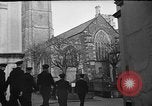 Image of United States Coast Guard personnel march in formation to Sunday service at a church England United Kingdom, 1944, second 15 stock footage video 65675051454