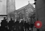 Image of United States Coast Guard personnel march in formation to Sunday service at a church England United Kingdom, 1944, second 17 stock footage video 65675051454