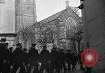 Image of United States Coast Guard personnel march in formation to Sunday service at a church England United Kingdom, 1944, second 18 stock footage video 65675051454