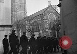 Image of United States Coast Guard personnel march in formation to Sunday service at a church England United Kingdom, 1944, second 20 stock footage video 65675051454