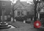 Image of United States Coast Guard personnel march in formation to Sunday service at a church England United Kingdom, 1944, second 22 stock footage video 65675051454