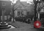 Image of United States Coast Guard personnel march in formation to Sunday service at a church England United Kingdom, 1944, second 24 stock footage video 65675051454