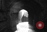 Image of United States Coast Guard personnel march in formation to Sunday service at a church England United Kingdom, 1944, second 29 stock footage video 65675051454