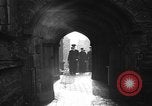 Image of United States Coast Guard personnel march in formation to Sunday service at a church England United Kingdom, 1944, second 31 stock footage video 65675051454