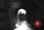 Image of United States Coast Guard personnel march in formation to Sunday service at a church England United Kingdom, 1944, second 32 stock footage video 65675051454
