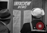 Standbild Nachrichten über die alliierte Invasion in der Normandie United States USA, 1944, aus Sekunde 23 historischem Filmmaterial Videoclip 65675051456