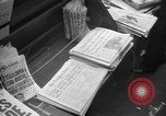 Image of Newspaper headlines tell of Allied invasion New York City USA, 1944, second 5 stock footage video 65675051457
