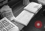 Image of Newspaper headlines tell of Allied invasion New York City USA, 1944, second 7 stock footage video 65675051457