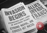 Image of Newspaper headlines tell of Allied invasion New York City USA, 1944, second 9 stock footage video 65675051457
