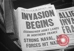 Image of Newspaper headlines tell of Allied invasion New York City USA, 1944, second 10 stock footage video 65675051457