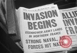 Image of Newspaper headlines tell of Allied invasion New York City USA, 1944, second 12 stock footage video 65675051457