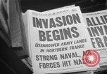 Image of Newspaper headlines tell of Allied invasion New York City USA, 1944, second 13 stock footage video 65675051457