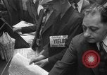 Image of Newspaper headlines tell of Allied invasion New York City USA, 1944, second 15 stock footage video 65675051457
